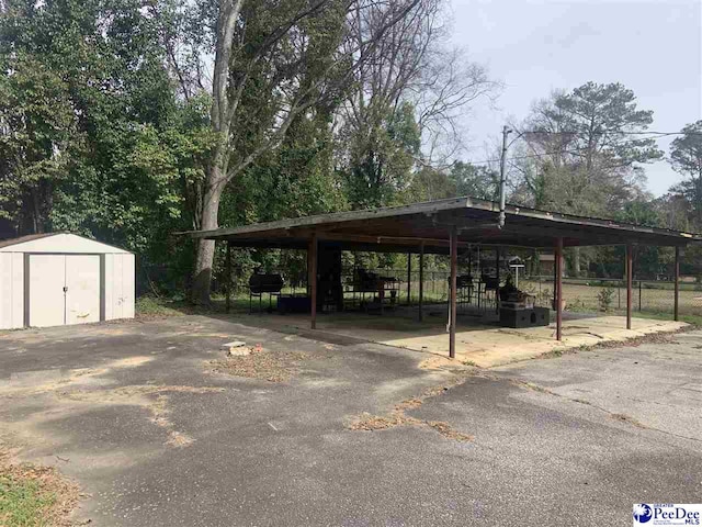 view of parking with a carport