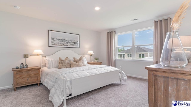 bedroom featuring carpet, baseboards, and visible vents