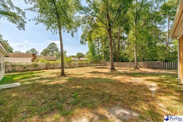 view of yard featuring a fenced backyard