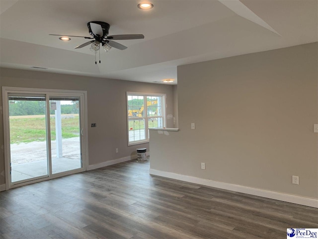 4974 E National Cemetery Rd, Florence, SC 29506 - empty room featuring baseboards, a ceiling fan, recessed lighting, plenty of natural light, and dark wood-style floors