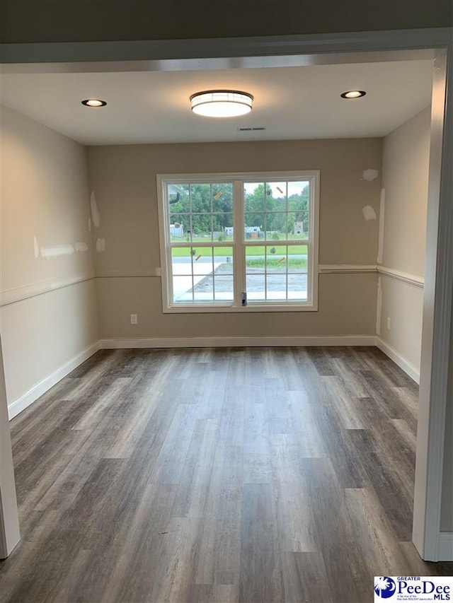 4974 E National Cemetery Rd, Florence, SC 29506 - empty room with dark wood-style floors, baseboards, and recessed lighting