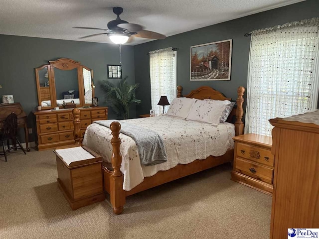 159 Ridge Rd, Cheraw, SC 29512 - bedroom with light carpet, a textured ceiling, and a ceiling fan