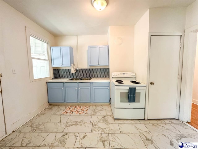 151 Harrell St, Florence, SC 29501 - kitchen with tasteful backsplash, sink, and white range with electric cooktop