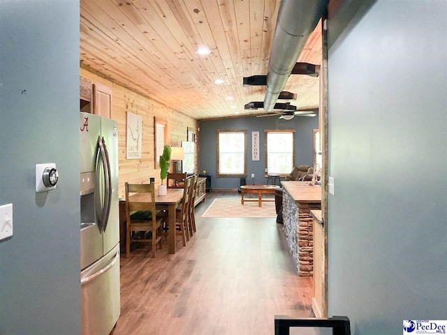 kitchen featuring wooden ceiling, wood finished floors, recessed lighting, stainless steel fridge, and ceiling fan