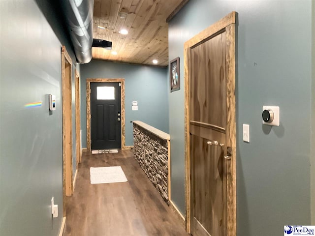 entryway with wood ceiling and wood finished floors