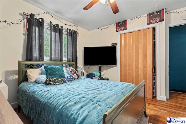 304 Wells St, Darlington, SC 29532 - bedroom featuring wood finished floors, lofted ceiling, a closet, baseboards, and ceiling fan