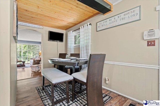 304 Wells St, Darlington, SC 29532 - dining room with wood ceiling, wood finished floors, a wainscoted wall, and arched walkways