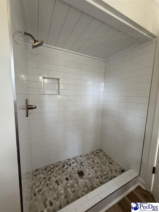 418 S Thomas Rd, Florence, SC 29501 - bathroom with a stall shower and wood finished floors
