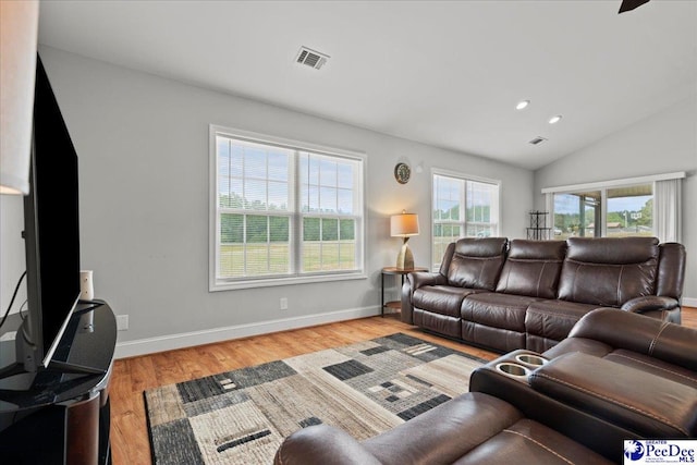 living area with vaulted ceiling, visible vents, baseboards, recessed lighting, and wood finished floors