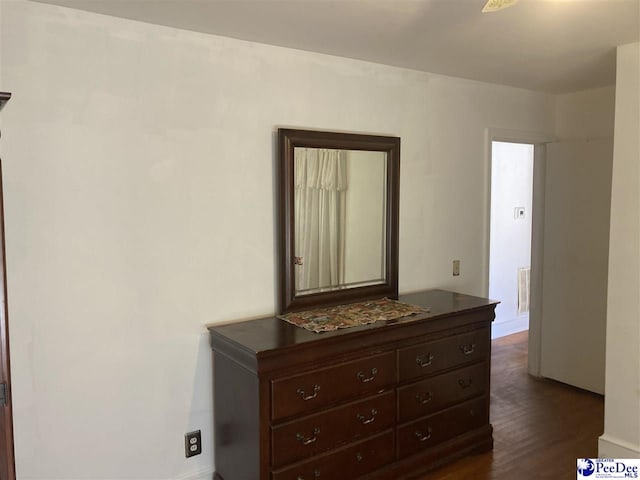 interior space with dark hardwood / wood-style floors