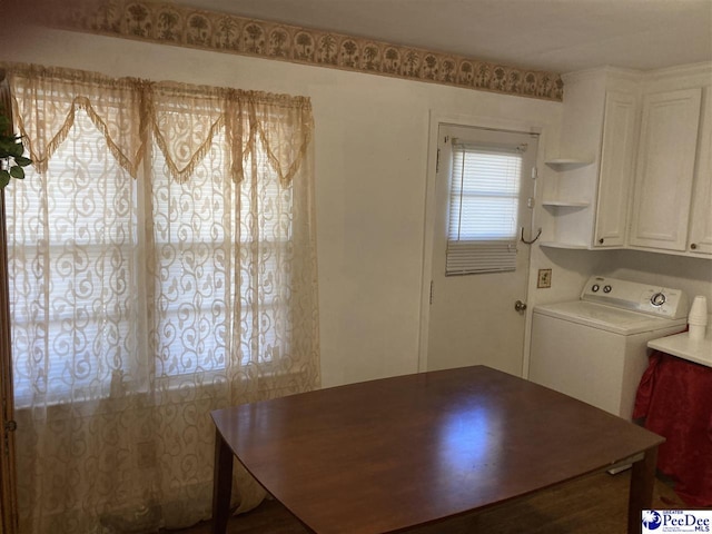 unfurnished dining area with washer / dryer