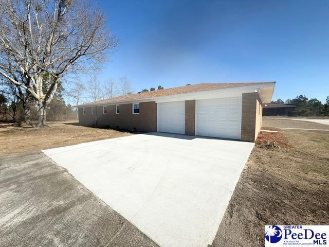 view of home's exterior featuring a garage