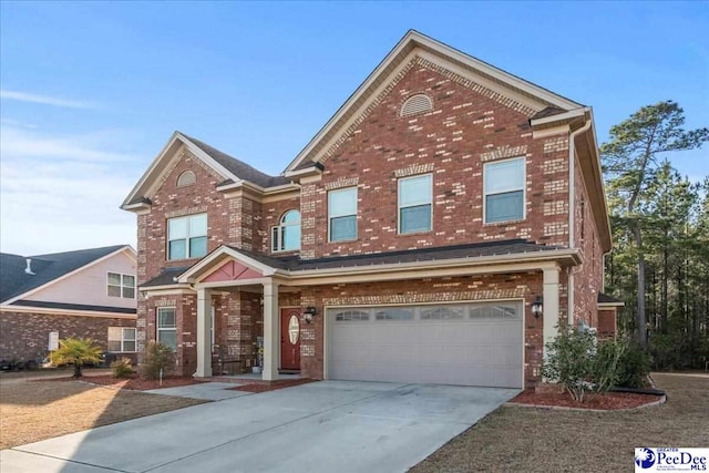 view of front of home with a garage