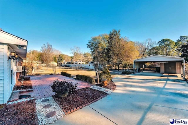 view of yard featuring a carport