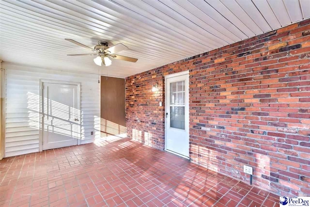 interior space featuring ceiling fan