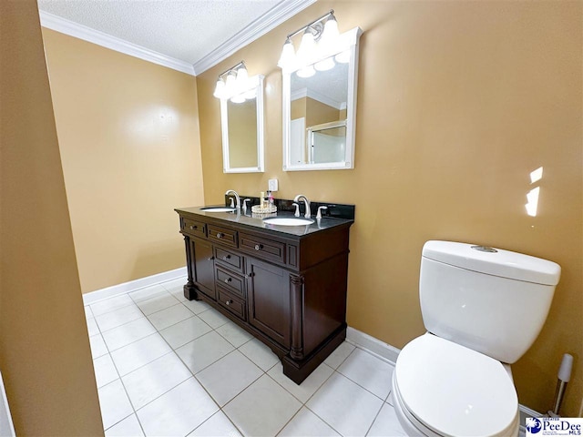 bathroom featuring tile patterned flooring, vanity, ornamental molding, and toilet