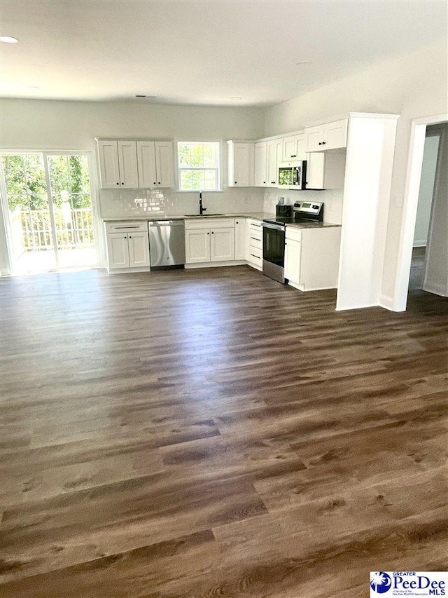 51 Boyd Ln, Cheraw, SC 25920 - kitchen with appliances with stainless steel finishes, a sink, dark wood-style floors, and white cabinetry