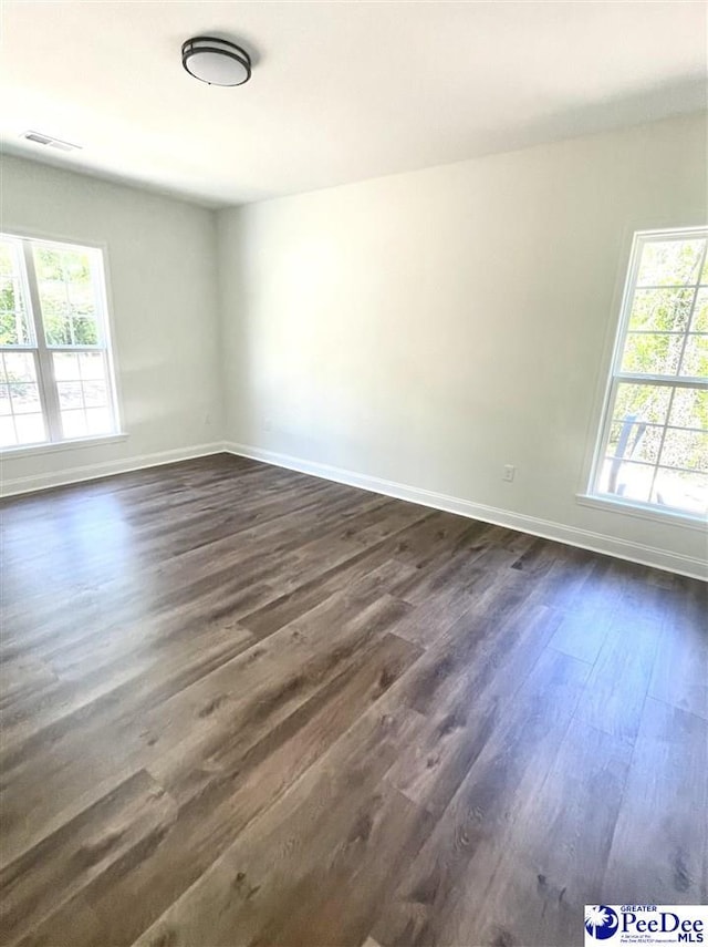 51 Boyd Ln, Cheraw, SC 25920 - spare room with dark wood finished floors and baseboards