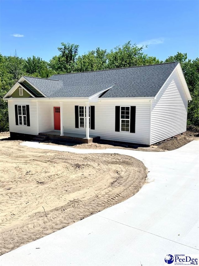 51 Boyd Ln, Cheraw, SC 25920 - ranch-style home with a shingled roof and a porch