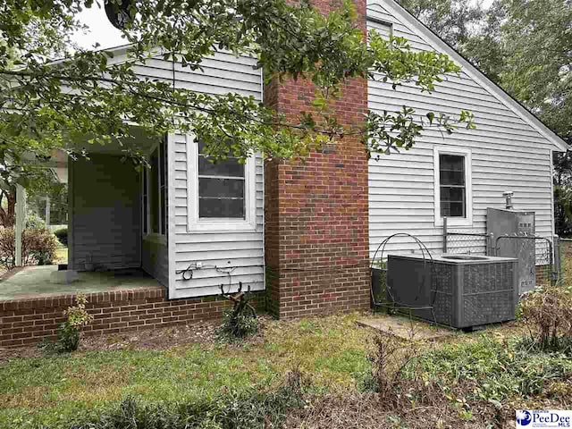 view of property exterior featuring cooling unit