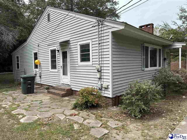 view of front of house featuring a patio