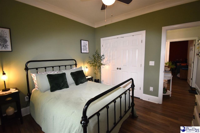 3804 Beckford St, Florence, SC 29501 - bedroom with dark wood-style floors, baseboards, crown molding, a closet, and ceiling fan