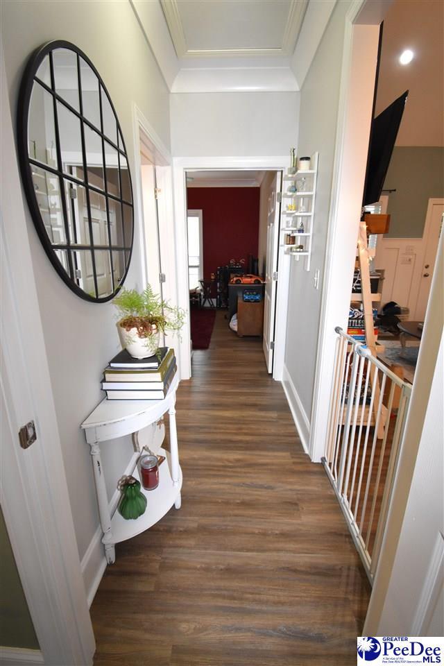 3804 Beckford St, Florence, SC 29501 - hall featuring wood finished floors and ornamental molding