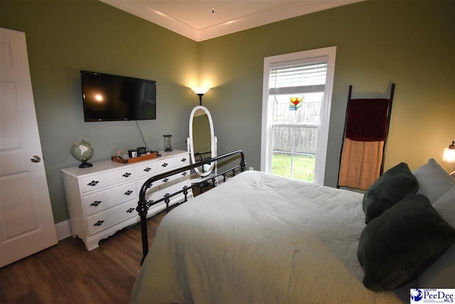 3804 Beckford St, Florence, SC 29501 - bedroom with dark wood-type flooring and baseboards