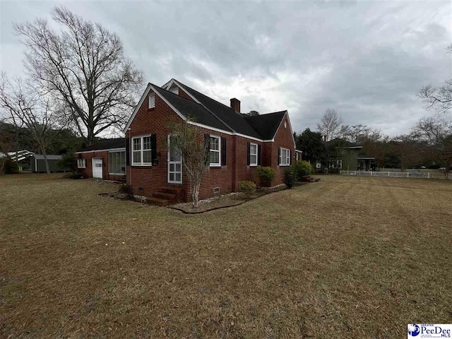 view of property exterior with a lawn