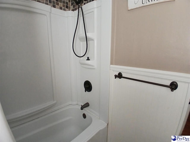 bathroom with shower / bath combination