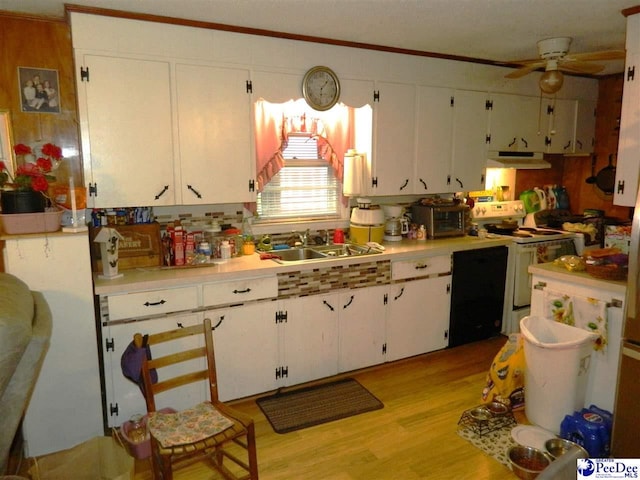kitchen with white electric range oven, a sink, ceiling fan, white cabinets, and under cabinet range hood