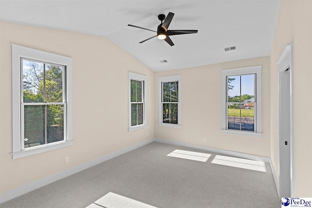 125 E Pine St, Florence, SC 29506 - carpeted empty room with lofted ceiling and a ceiling fan