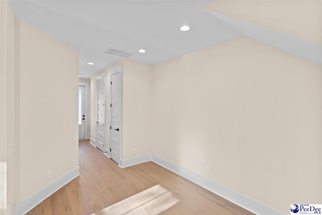 125 E Pine St, Florence, SC 29506 - unfurnished room with light wood-style floors and recessed lighting