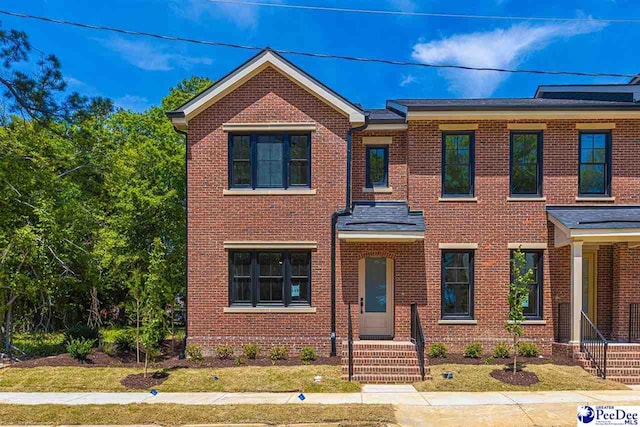 125 E Pine St, Florence, SC 29506 - view of front of home featuring brick siding