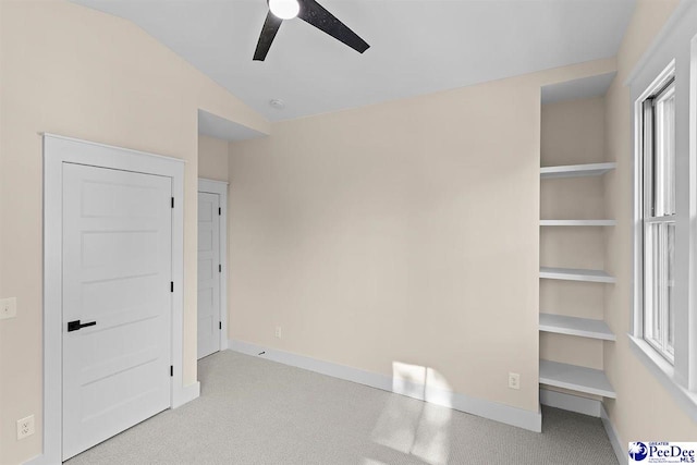 125 E Pine St, Florence, SC 29506 - unfurnished bedroom with vaulted ceiling and a ceiling fan