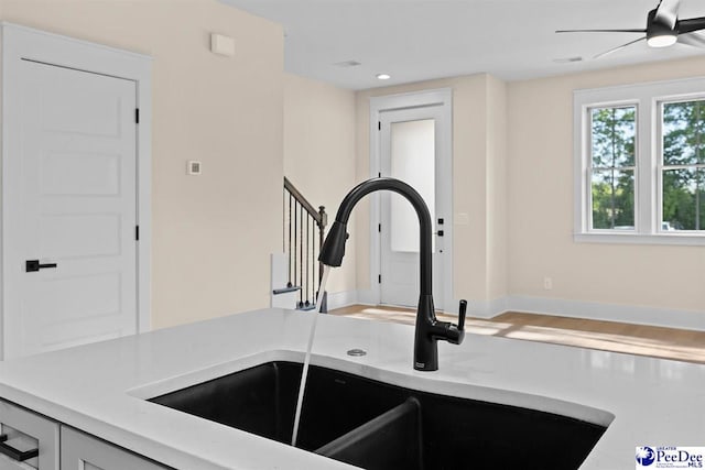 125 E Pine St, Florence, SC 29506 - kitchen view of ceiling fan, light stone countertops, and recessed lighting