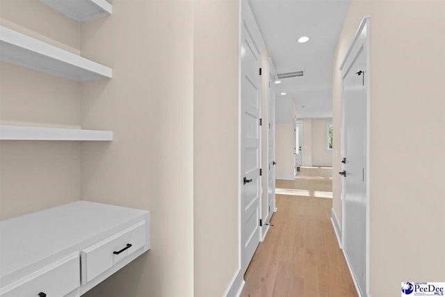 125 E Pine St, Florence, SC 29506 - hall featuring light wood-style flooring and recessed lighting