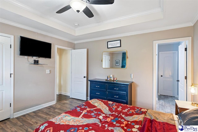 170 Dogwood Ave, Darlington, SC 29532 - bedroom featuring a tray ceiling, crown molding, and wood finished floors