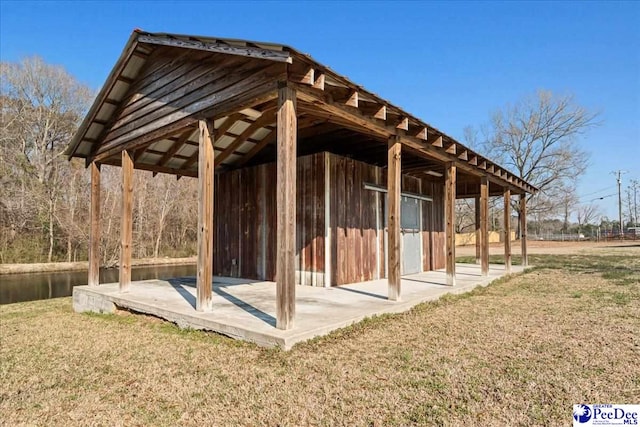 view of property's community with an outbuilding