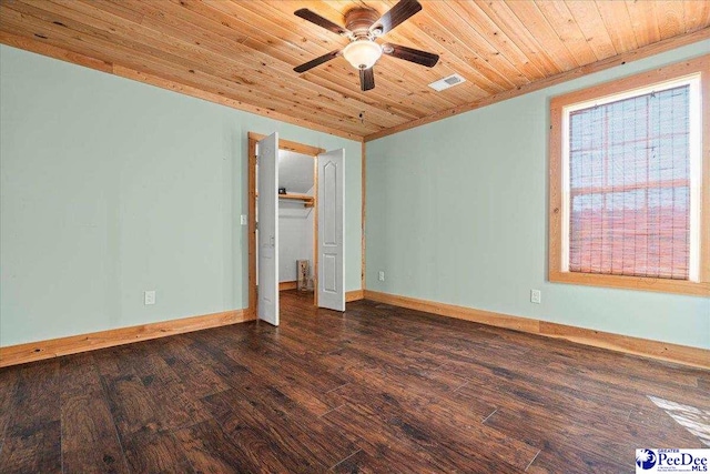 unfurnished bedroom featuring wooden ceiling, wood finished floors, visible vents, and baseboards