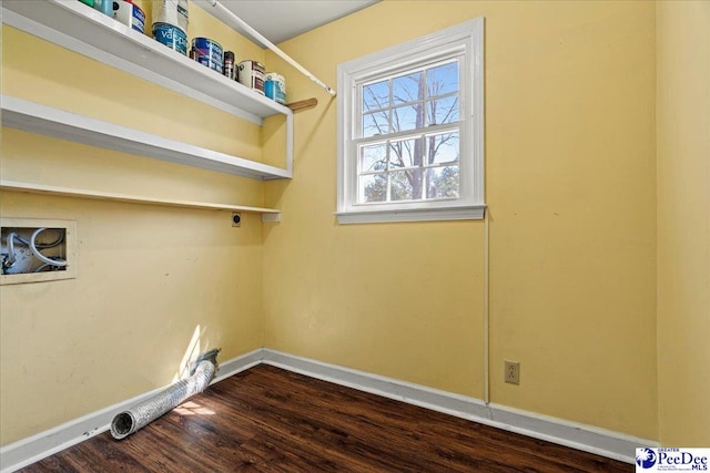 clothes washing area with washer hookup, dark wood finished floors, hookup for an electric dryer, laundry area, and baseboards