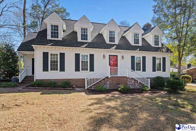 cape cod house featuring a shingled roof, crawl space, and a front yard