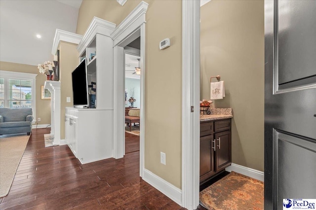3111 Cheshire Ln, Florence, SC 29501 - corridor featuring dark wood-type flooring and baseboards