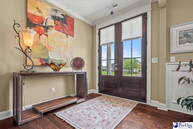 3111 Cheshire Ln, Florence, SC 29501 - foyer featuring french doors, crown molding, wood finished floors, and baseboards