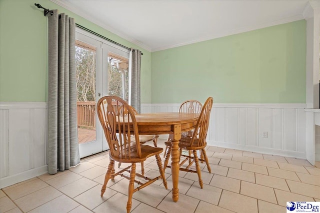 tiled dining space with crown molding