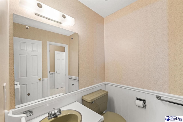 1110 Dunvegan Rd, Florence, SC 29501 - half bath with a wainscoted wall and vanity