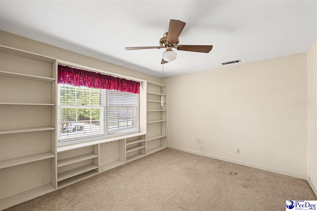 1110 Dunvegan Rd, Florence, SC 29501 - carpeted spare room with a ceiling fan and baseboards