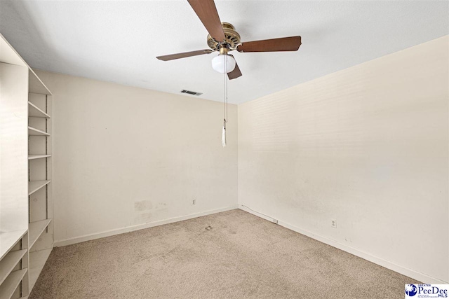 1110 Dunvegan Rd, Florence, SC 29501 - empty room with a ceiling fan and carpet floors
