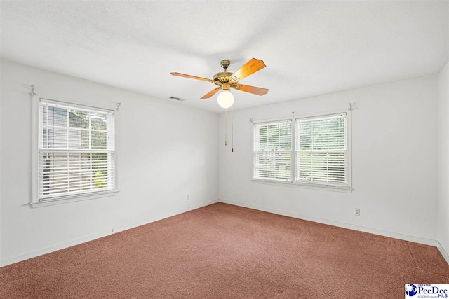 1110 Dunvegan Rd, Florence, SC 29501 - carpeted spare room with ceiling fan and baseboards