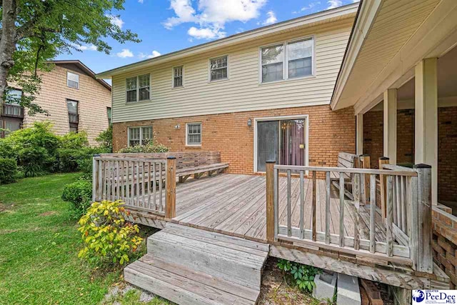 1110 Dunvegan Rd, Florence, SC 29501 - wooden deck with a lawn